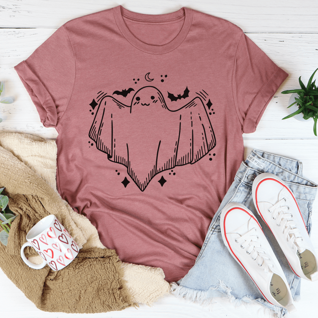 A cute little ghost graphic on a soft cotton Halloween tee, perfect for festive celebrations.