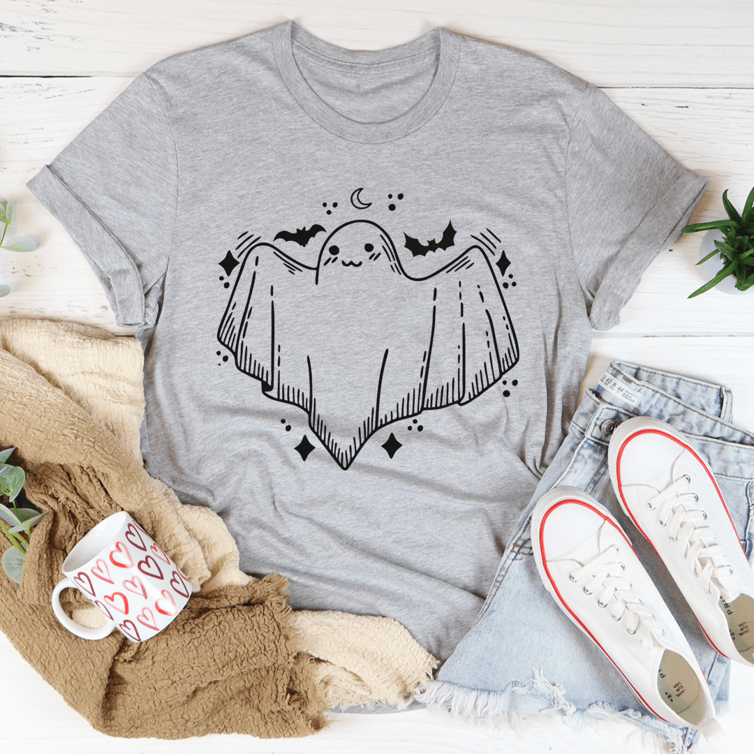 A cute little ghost graphic on a soft cotton Halloween tee, perfect for festive celebrations.