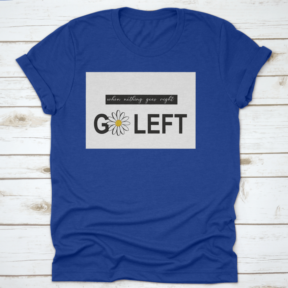 A vibrant t-shirt featuring a positive quote design with daisies and butterflies, showcasing a colorful floral pattern on a soft fabric.