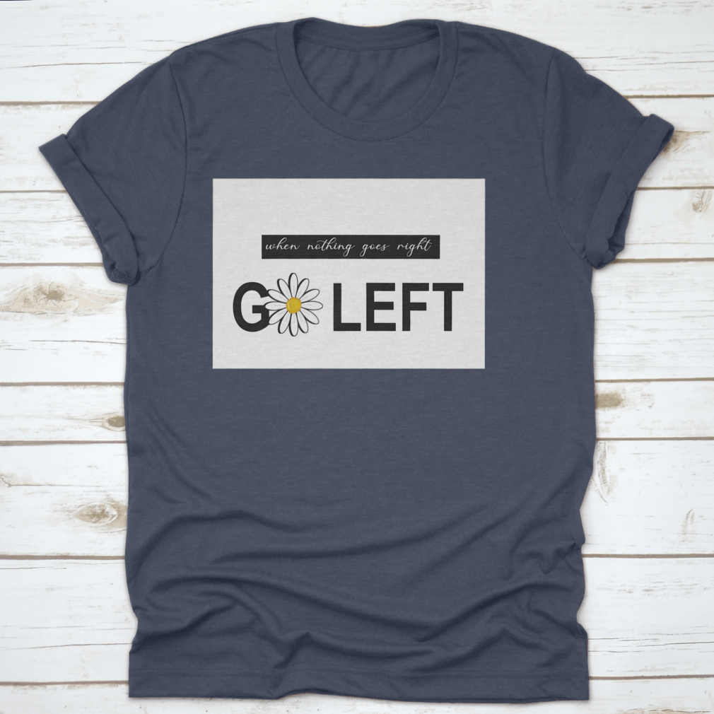 A vibrant t-shirt featuring a positive quote design with daisies and butterflies, showcasing a colorful floral pattern on a soft fabric.