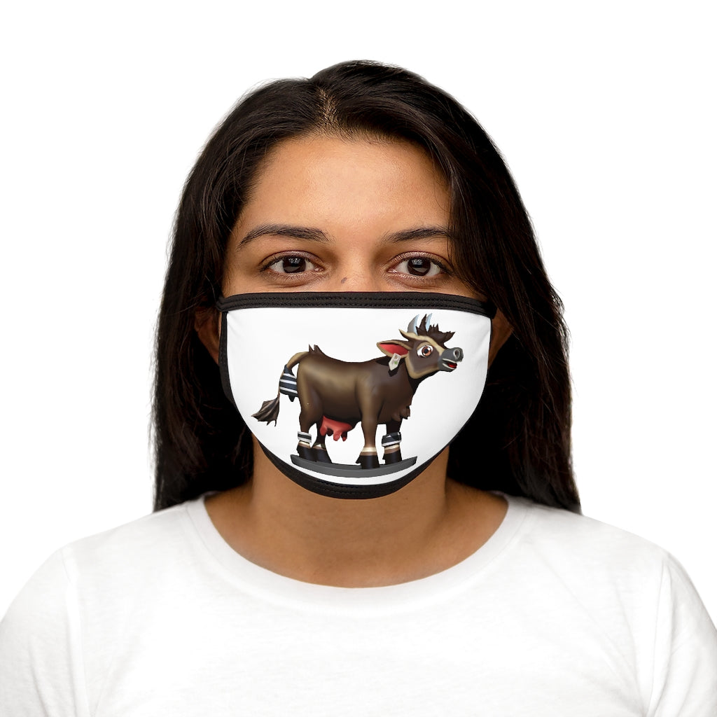 Dark brown cow print face mask with black edges and earloops, made from mixed fabrics for comfort and style.