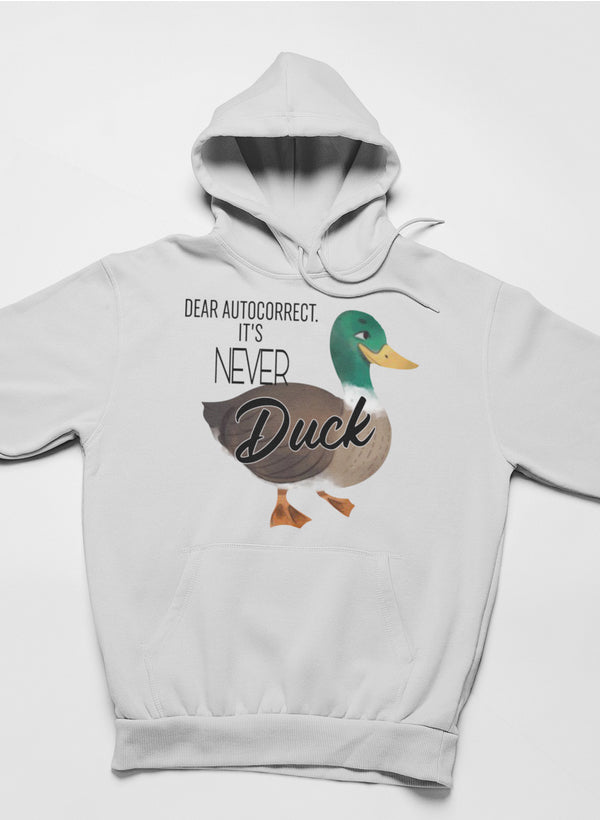 A cozy hoodie featuring the phrase 'Dear Autocorrect It's Never Duck', designed by top artists, showcasing a stylish and comfortable fit.