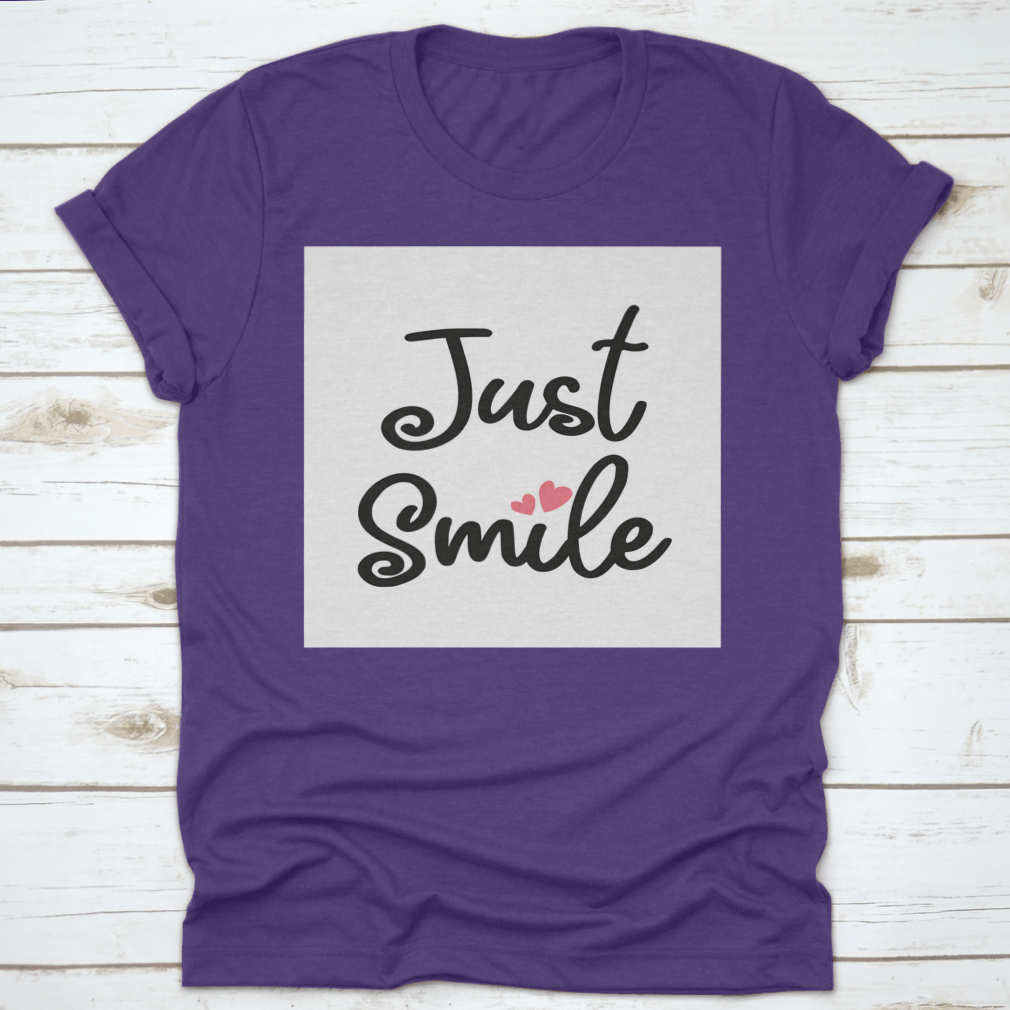 A stylish Decorative Just Smile Slogan T-shirt made from 100% cotton, featuring a positive message in a classic fit.