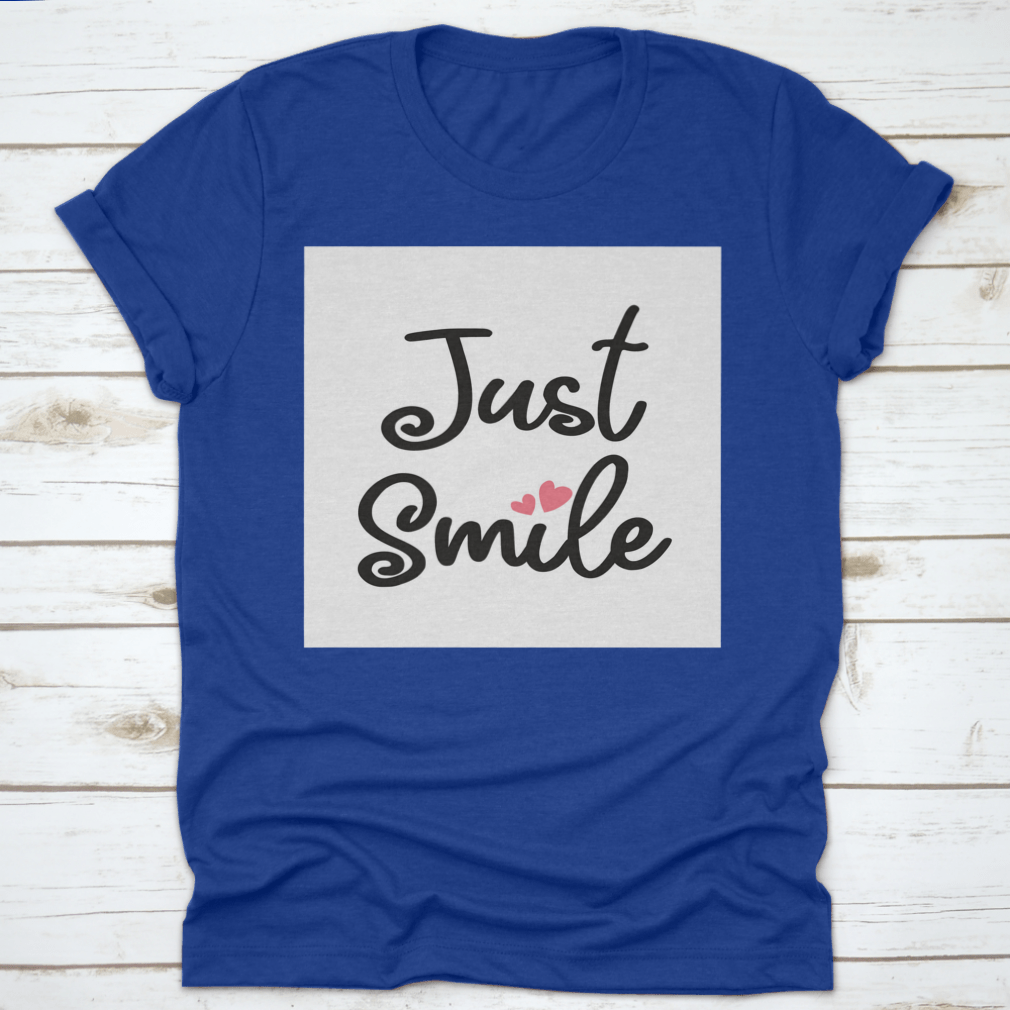 A stylish Decorative Just Smile Slogan T-shirt made from 100% cotton, featuring a positive message in a classic fit.