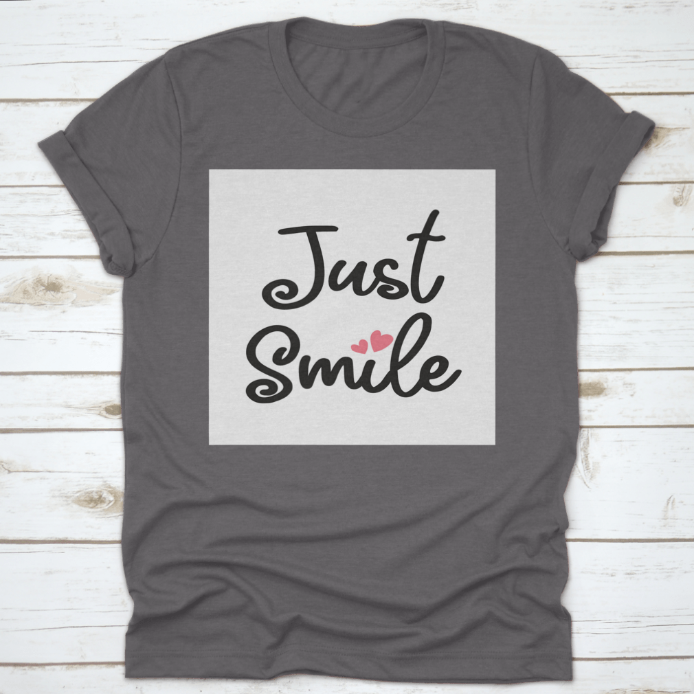 A stylish Decorative Just Smile Slogan T-shirt made from 100% cotton, featuring a positive message in a classic fit.