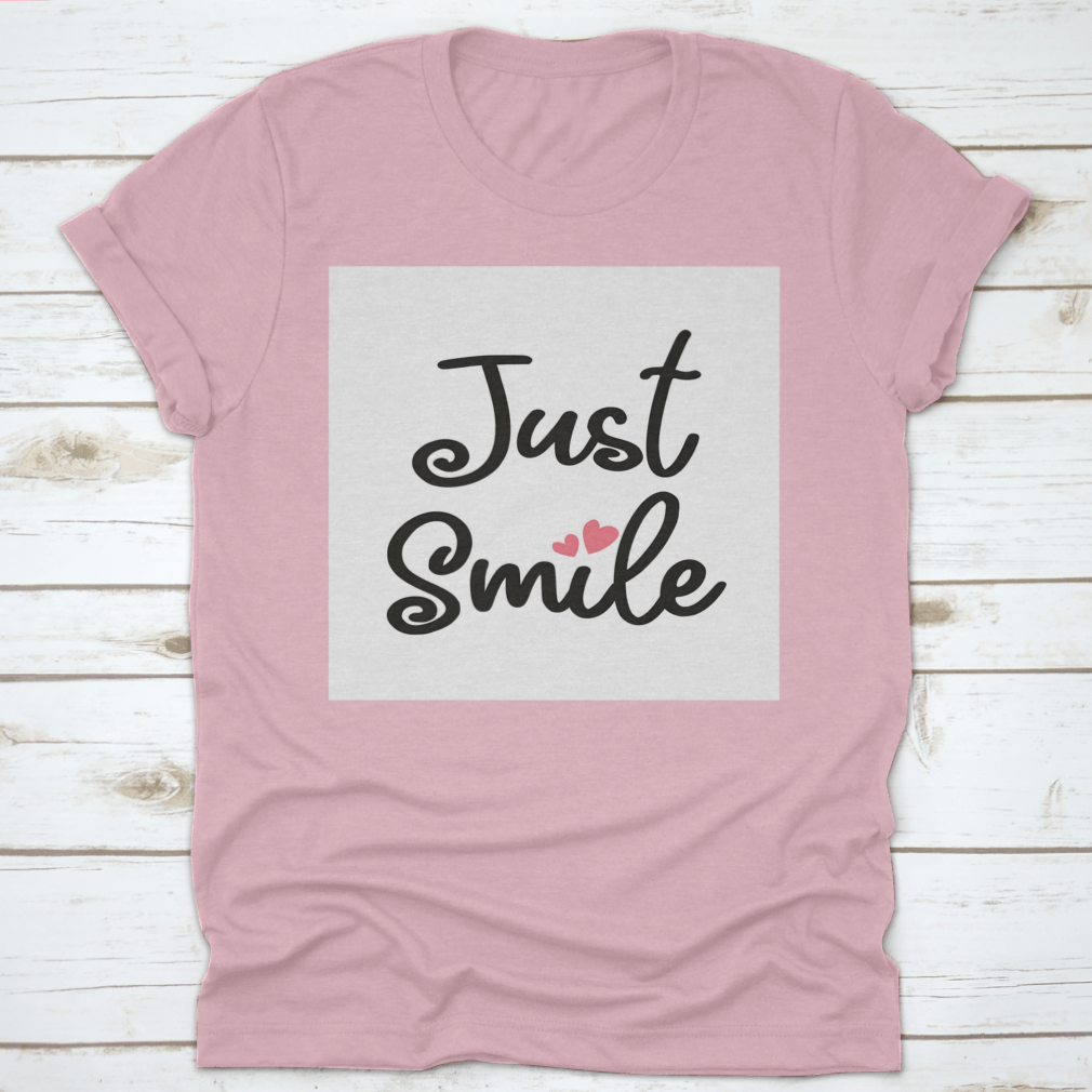 A stylish Decorative Just Smile Slogan T-shirt made from 100% cotton, featuring a positive message in a classic fit.