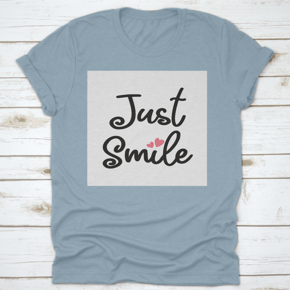 A stylish Decorative Just Smile Slogan T-shirt made from 100% cotton, featuring a positive message in a classic fit.