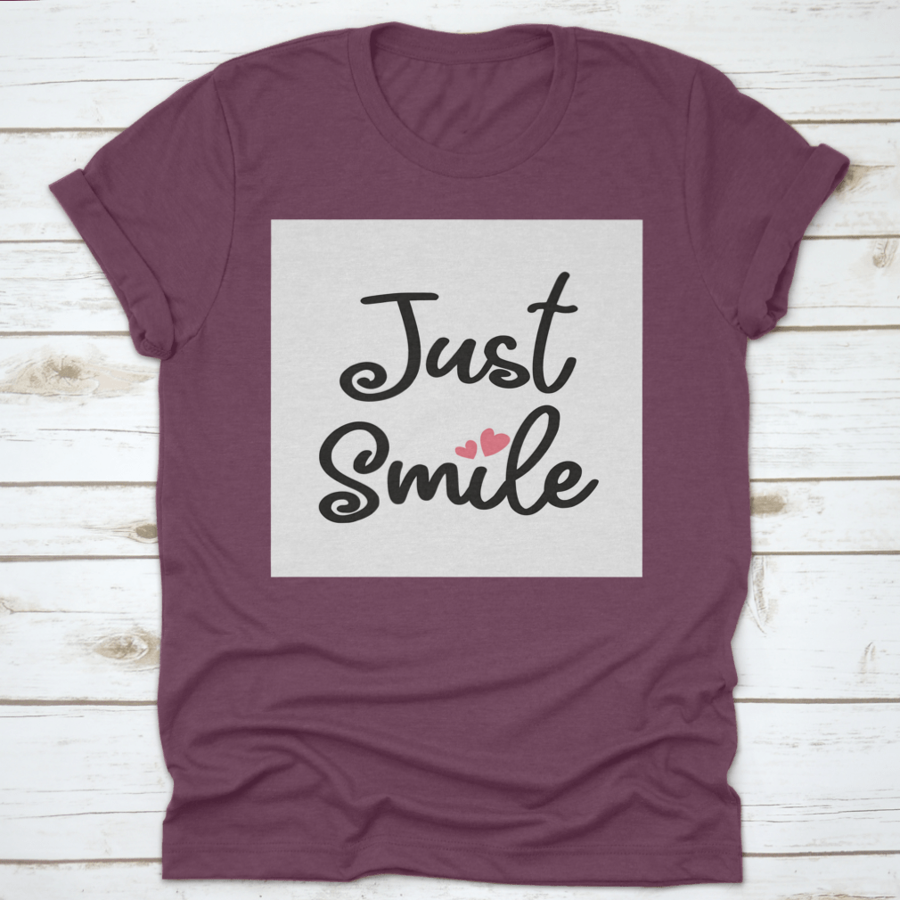 A stylish Decorative Just Smile Slogan T-shirt made from 100% cotton, featuring a positive message in a classic fit.