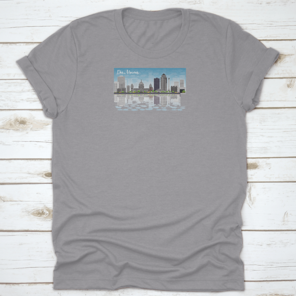Des Moines skyline featuring grey buildings under a blue sky, printed on a comfortable cotton T-shirt.