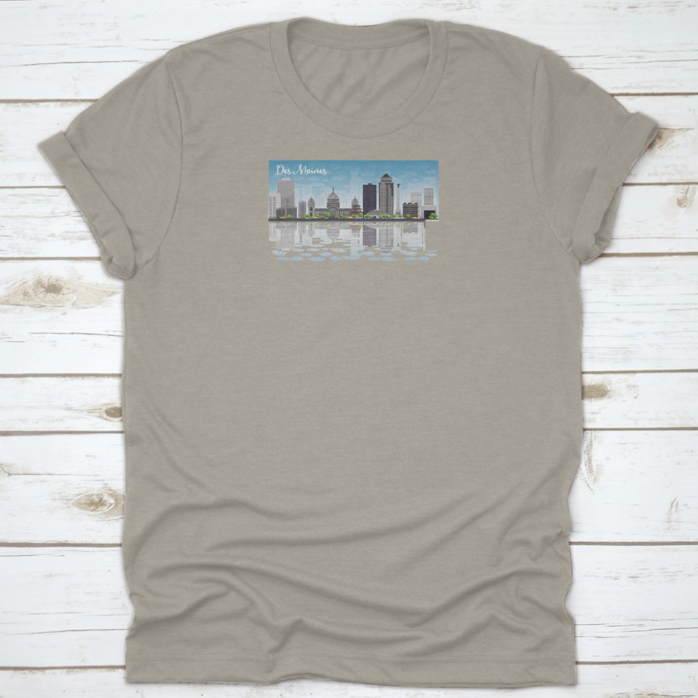 Des Moines skyline featuring grey buildings under a blue sky, printed on a comfortable cotton T-shirt.