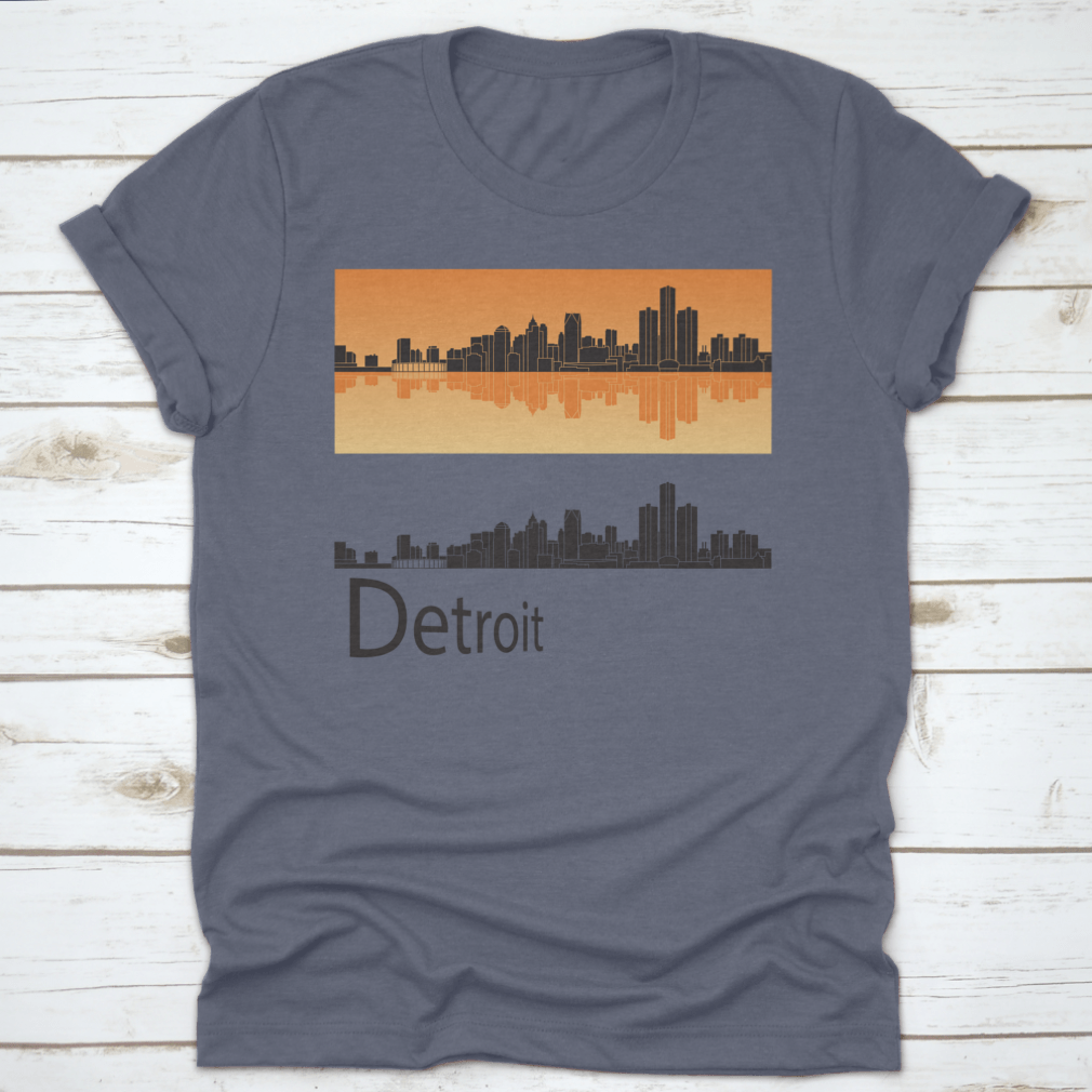 A vibrant orange t-shirt featuring the Detroit skyline reflected against a bright background, showcasing the city's iconic architecture.