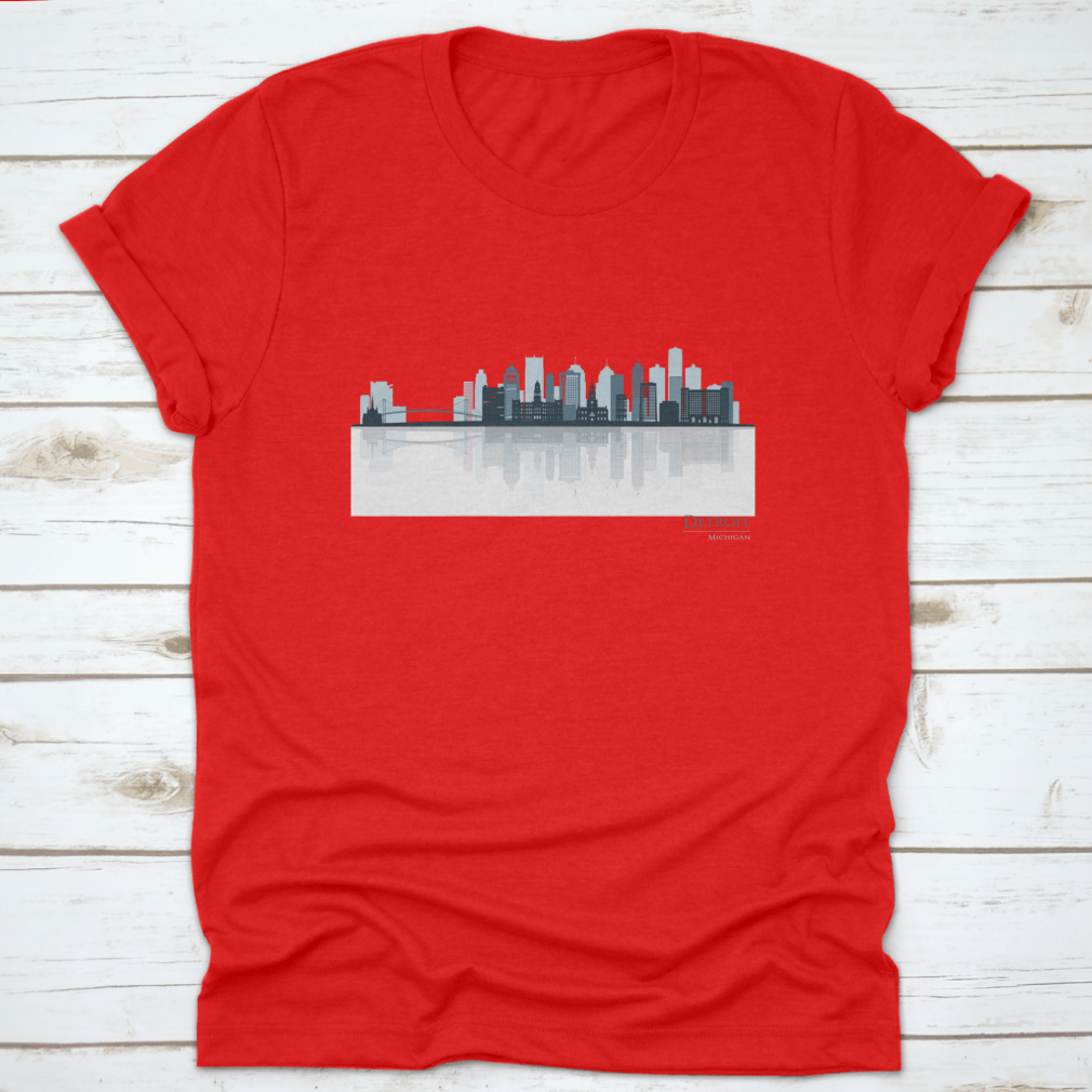 A stylish t-shirt featuring the Detroit skyline silhouette with reflection, showcasing iconic buildings in a modern design.