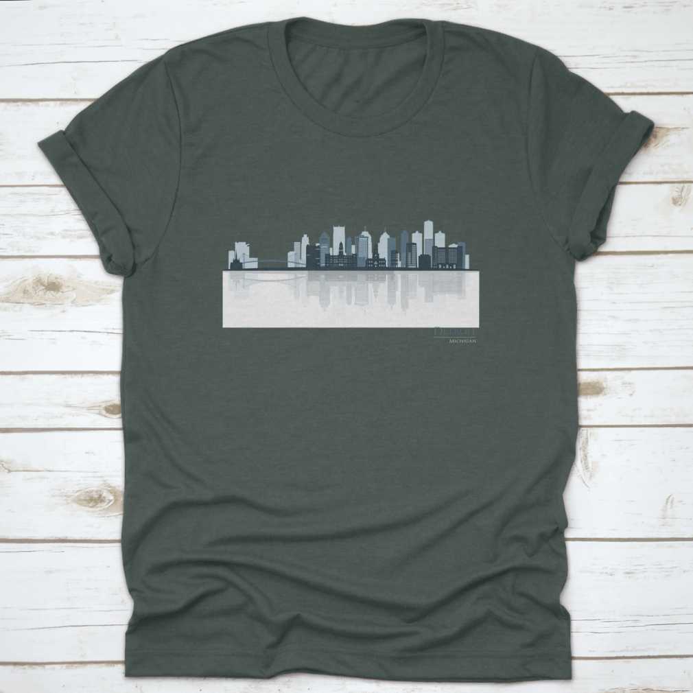 A stylish t-shirt featuring the Detroit skyline silhouette with reflection, showcasing iconic buildings in a modern design.