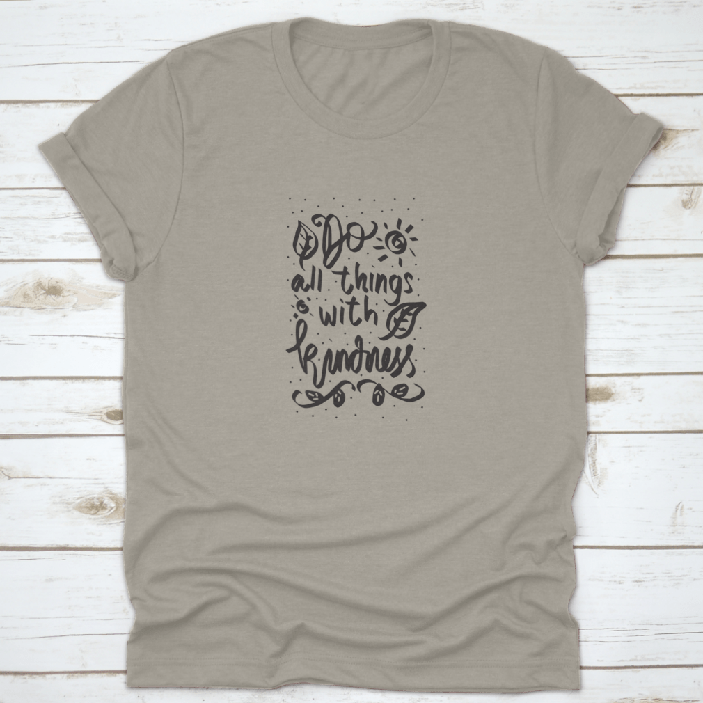 A stylish cotton t-shirt featuring a Floral Doodle design with the phrase 'Do All Things With Kindness' in a handwritten font.