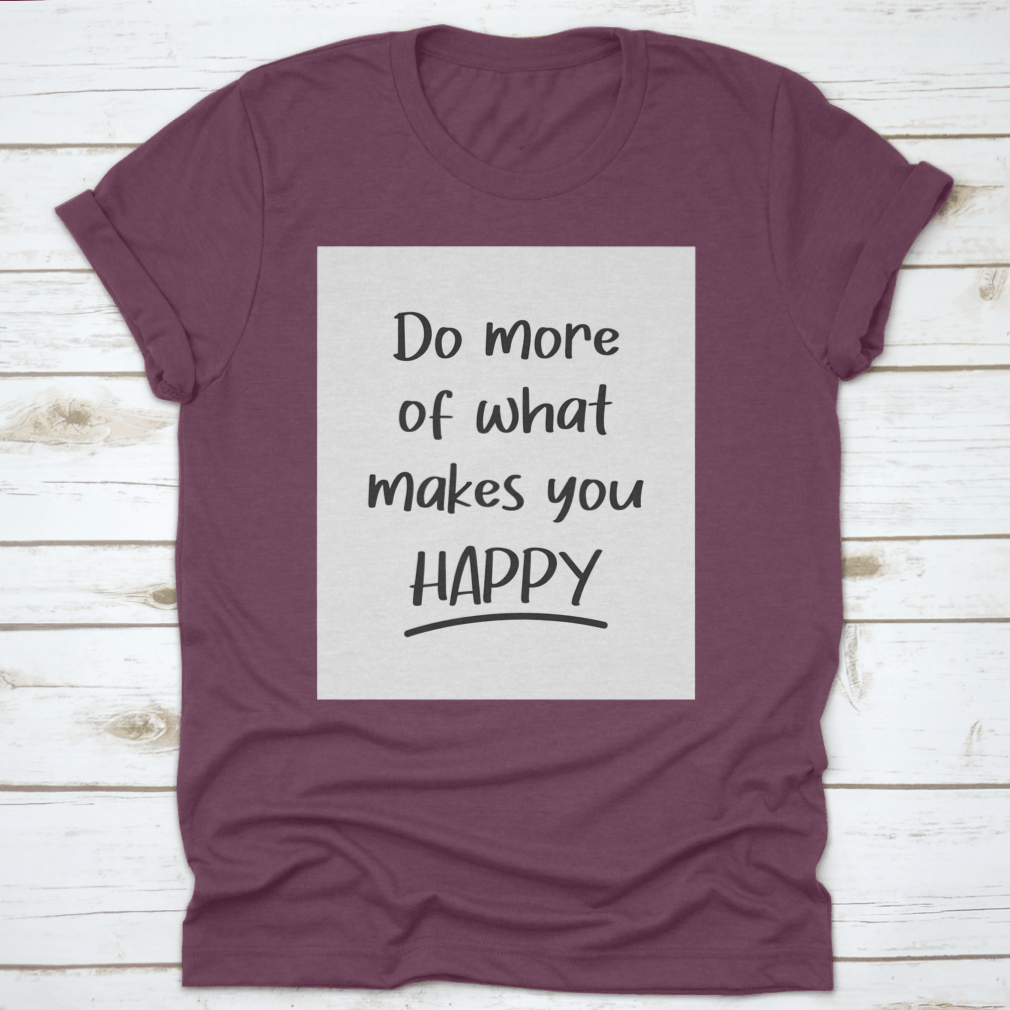 A stylish cotton t-shirt featuring the vector lettering inscription 'Do More Of What Makes You Happy', showcasing a positive message.