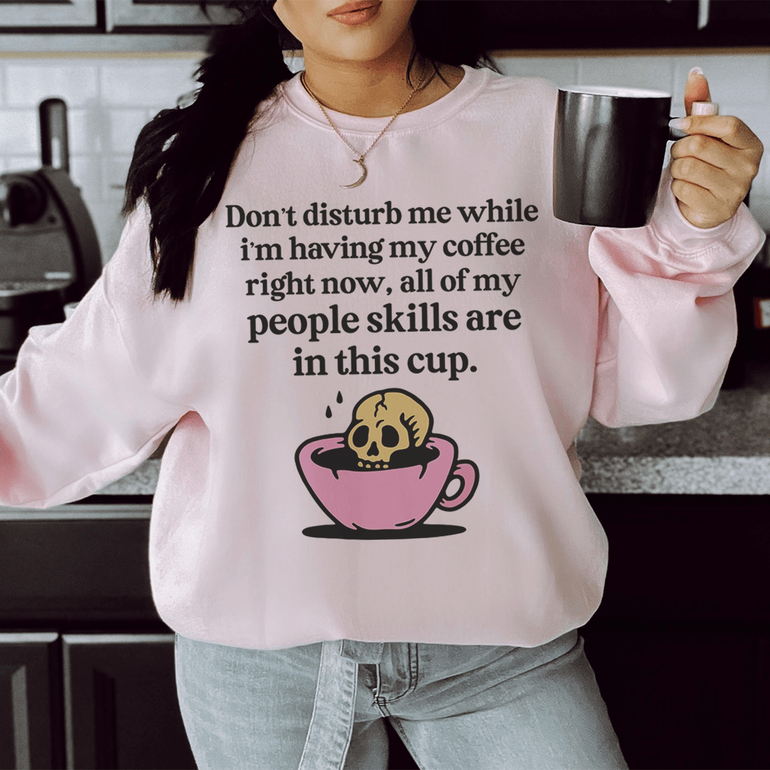 A cozy Don't Disturb Me Coffee hoodie made from cotton/poly fleece blend, featuring adjustable banded cuffs and a stylish design.