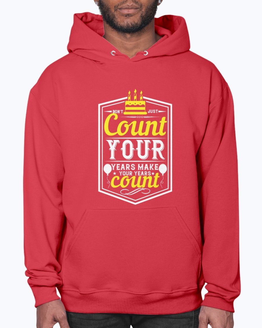 A stylish unisex hoodie featuring the motivational quote 'Don't just count your years, make your years count' in a vibrant design, perfect for birthday celebrations.