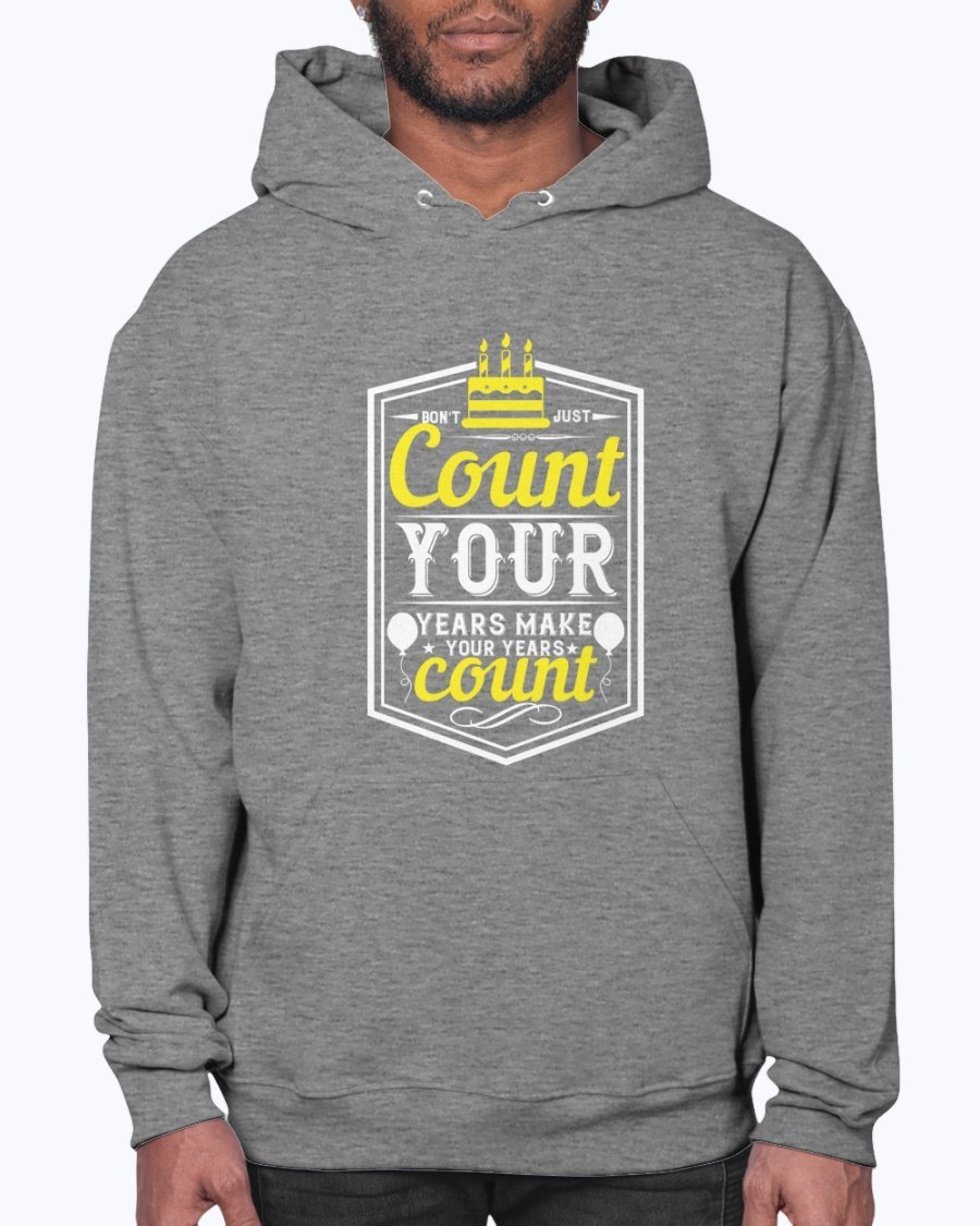 A stylish unisex hoodie featuring the motivational quote 'Don't just count your years, make your years count' in a vibrant design, perfect for birthday celebrations.