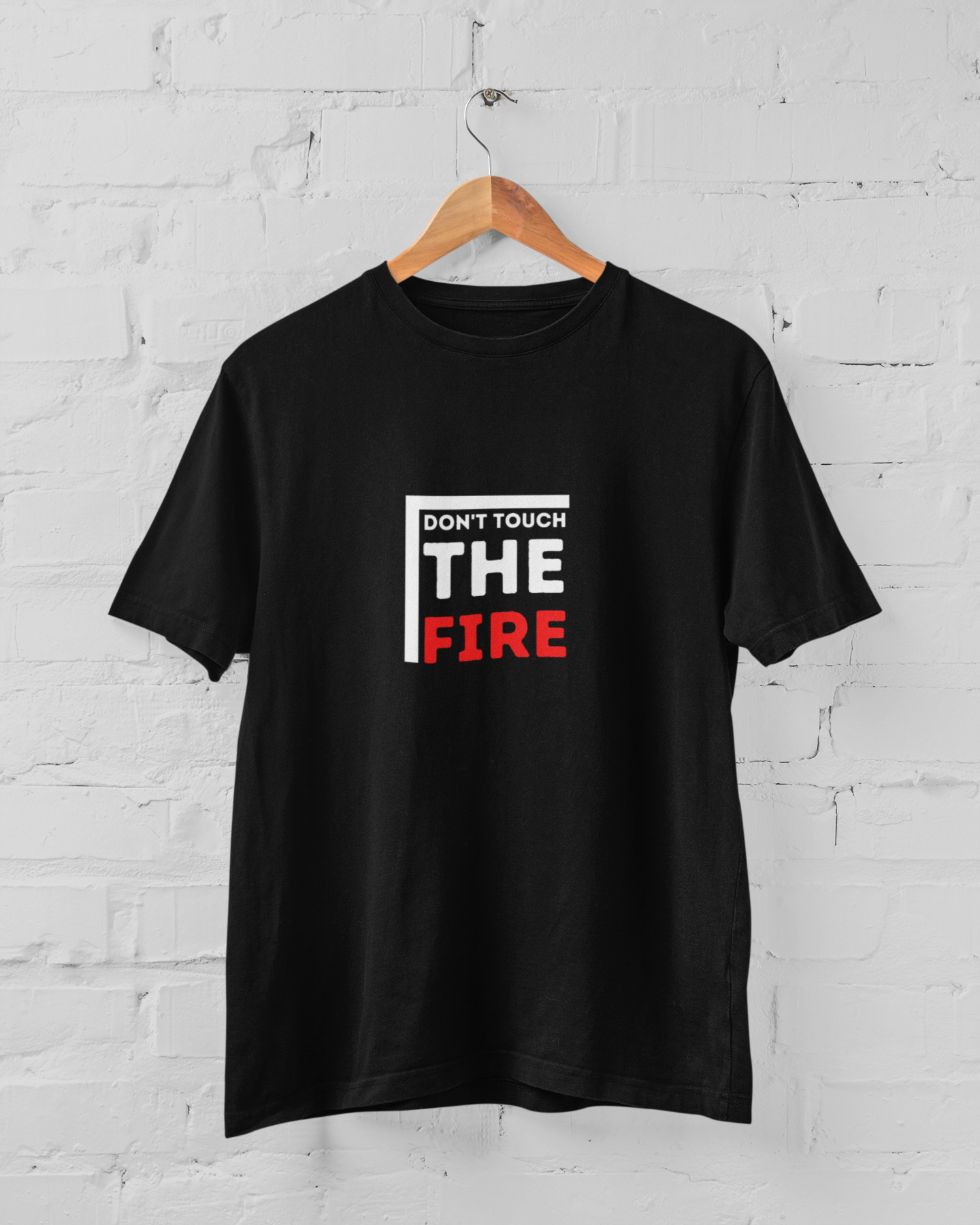 A classic unisex t-shirt featuring the phrase 'Don't Touch the Fire', made from durable cotton with stylish fitted sleeves.