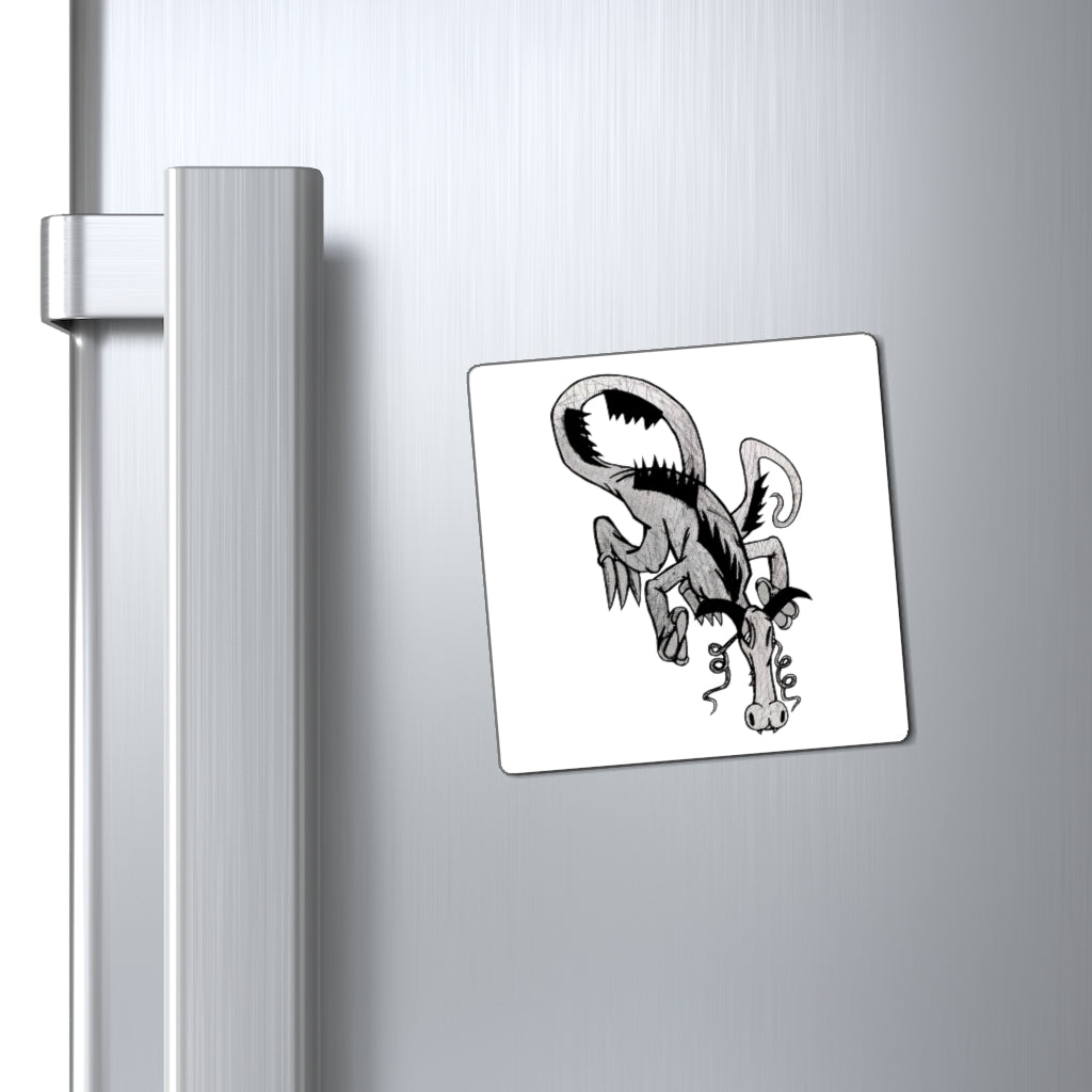 A set of Dragon Magnets showcasing various sizes and a bold black backing, ideal for displaying messages on metallic surfaces.