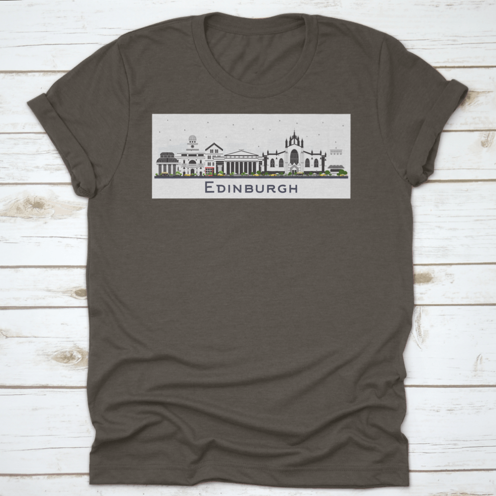 A colorful t-shirt featuring the Edinburgh Scotland city skyline design, showcasing vibrant buildings against a white background.