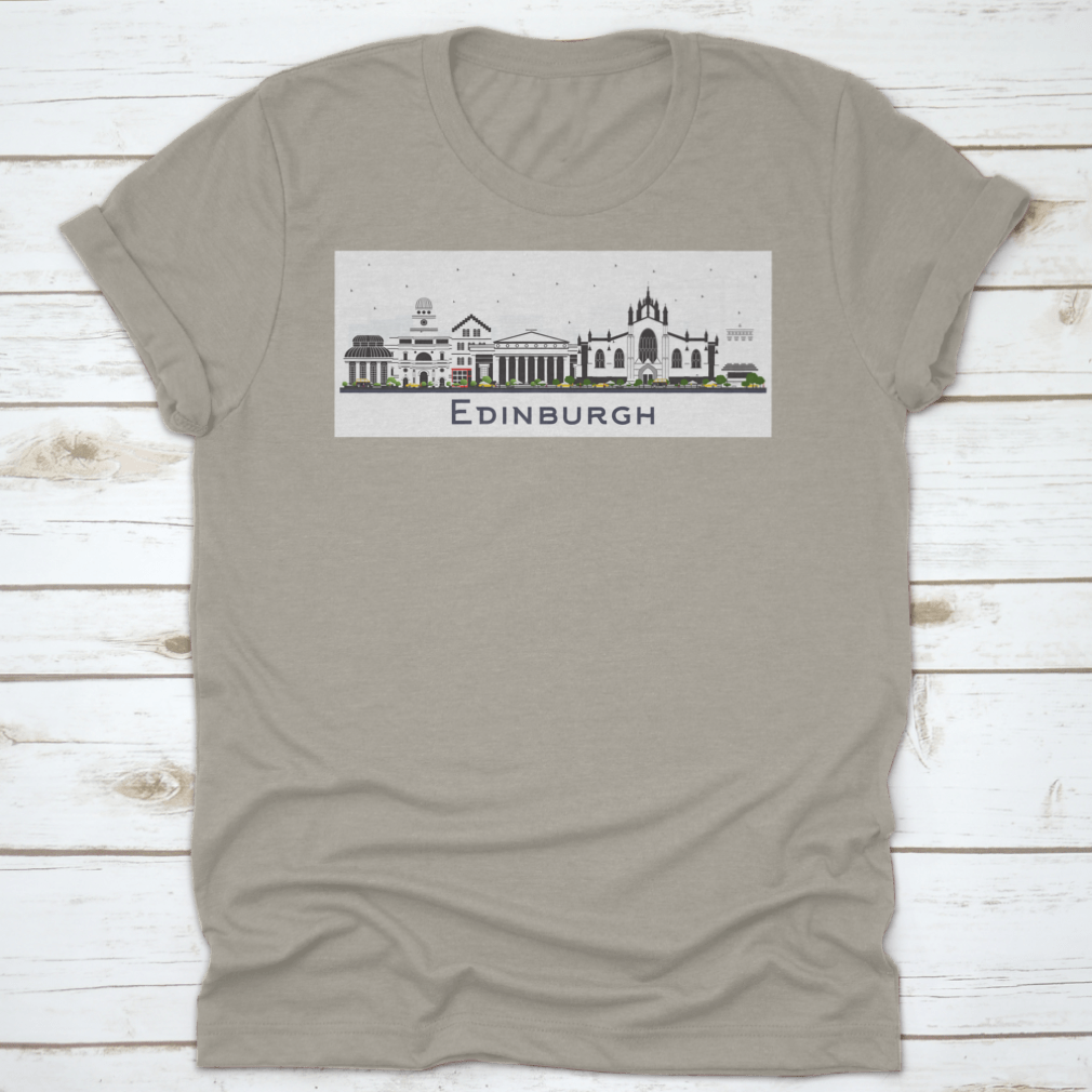 A colorful t-shirt featuring the Edinburgh Scotland city skyline design, showcasing vibrant buildings against a white background.