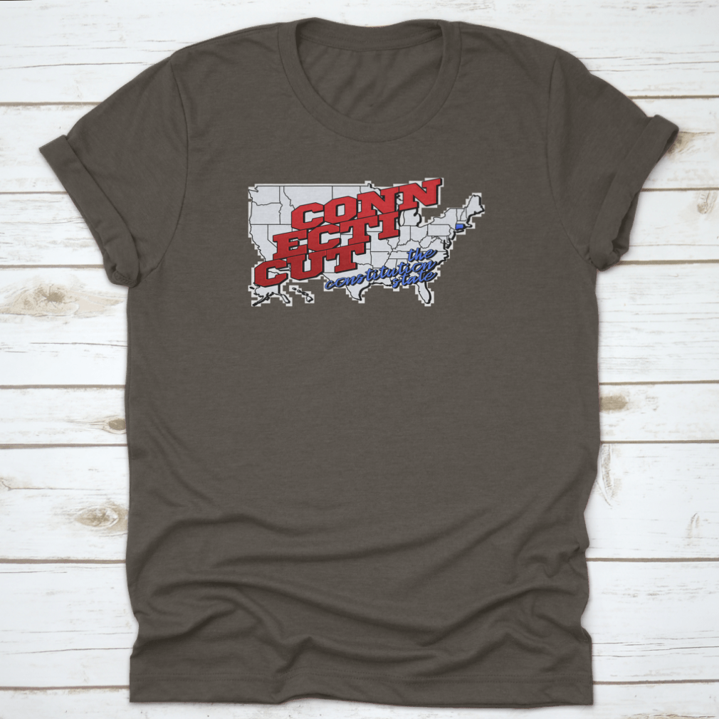 A colorful t-shirt featuring an elaborate map of Connecticut with vibrant typography, showcasing the state's landmarks and features.