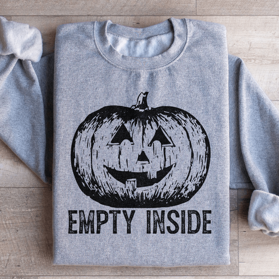 Cozy Empty Inside Pumpkin hoodie featuring a unique design by top artists, made from soft cotton/poly fleece blend.