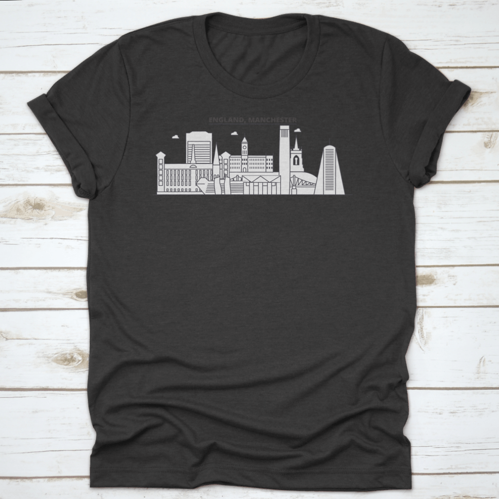A stylish t-shirt featuring the Manchester skyline, showcasing iconic architecture in a vibrant design.