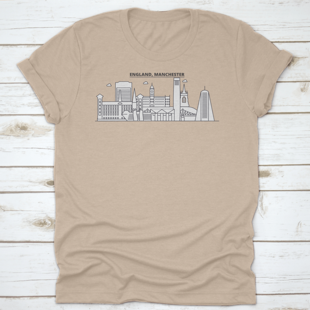 A stylish t-shirt featuring the Manchester skyline, showcasing iconic architecture in a vibrant design.