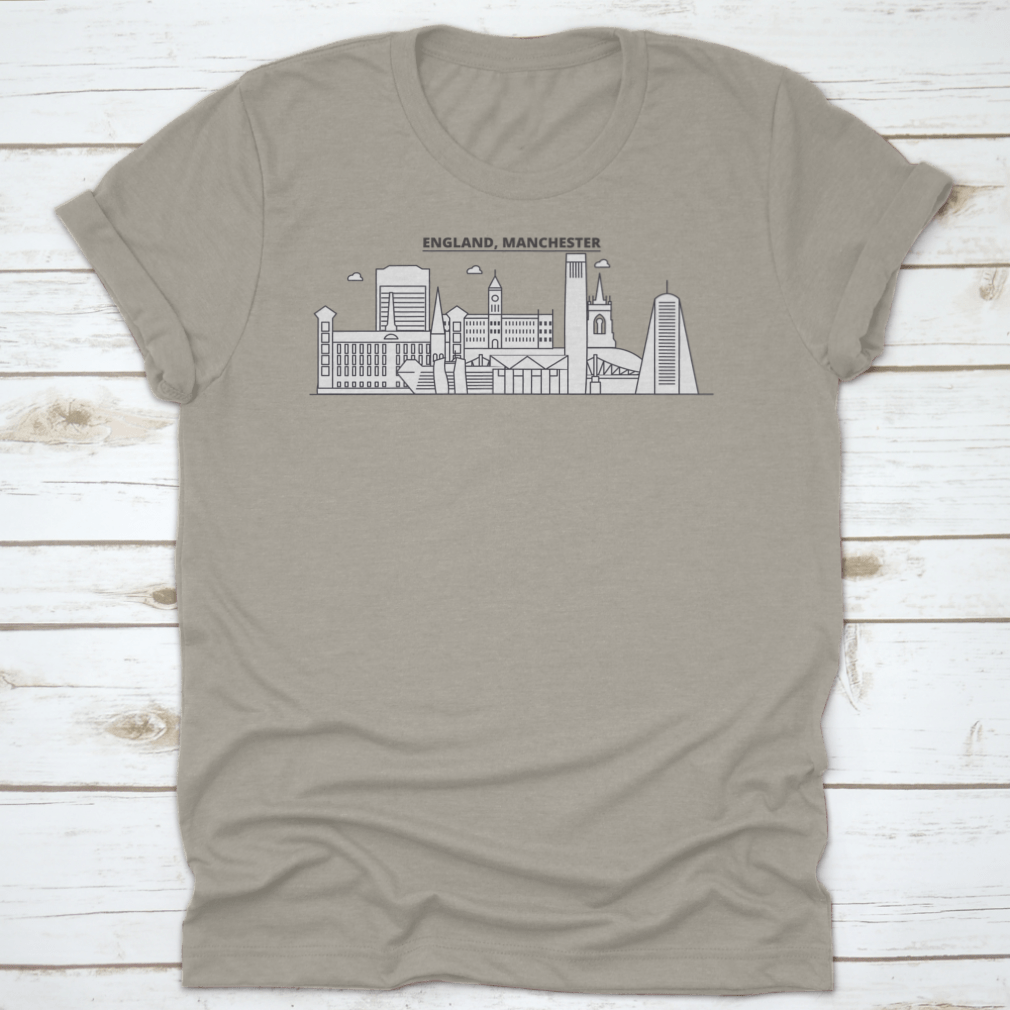 A stylish t-shirt featuring the Manchester skyline, showcasing iconic architecture in a vibrant design.
