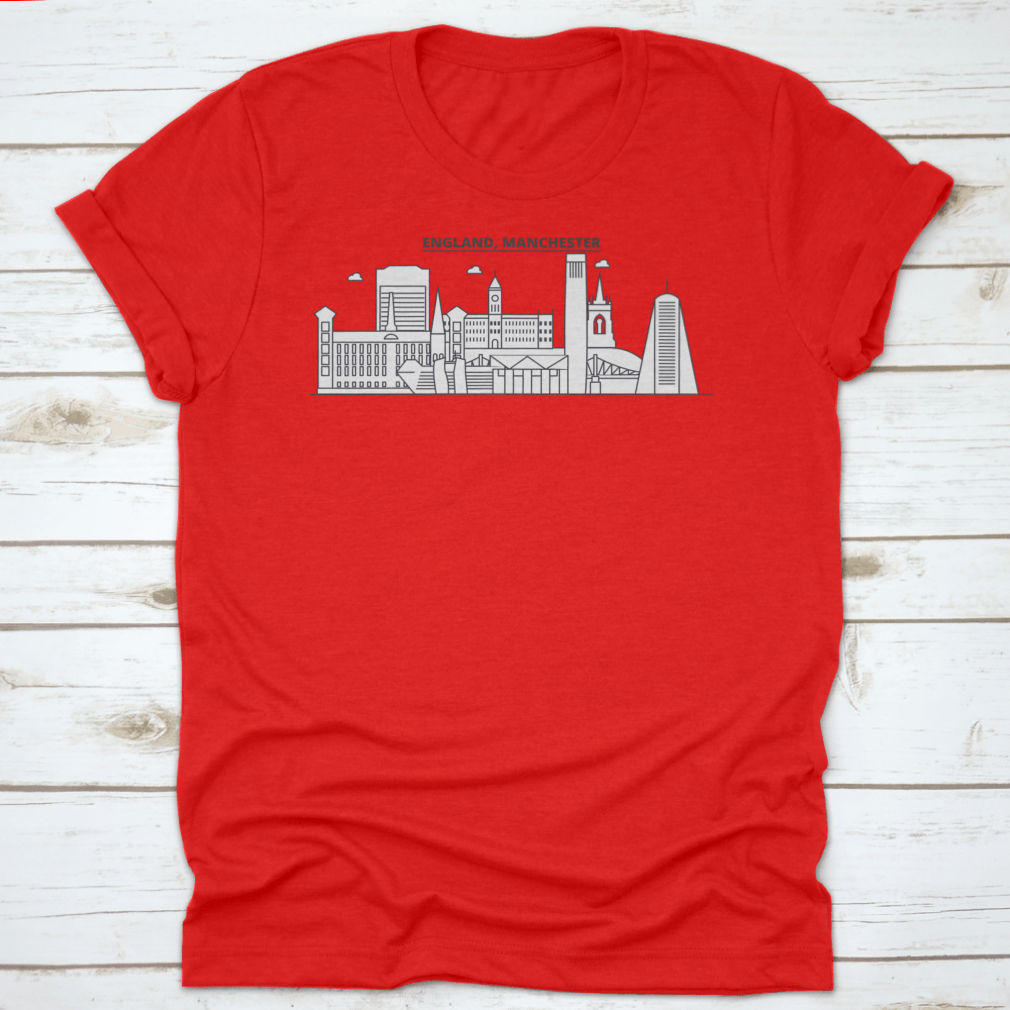 A stylish t-shirt featuring the Manchester skyline, showcasing iconic architecture in a vibrant design.
