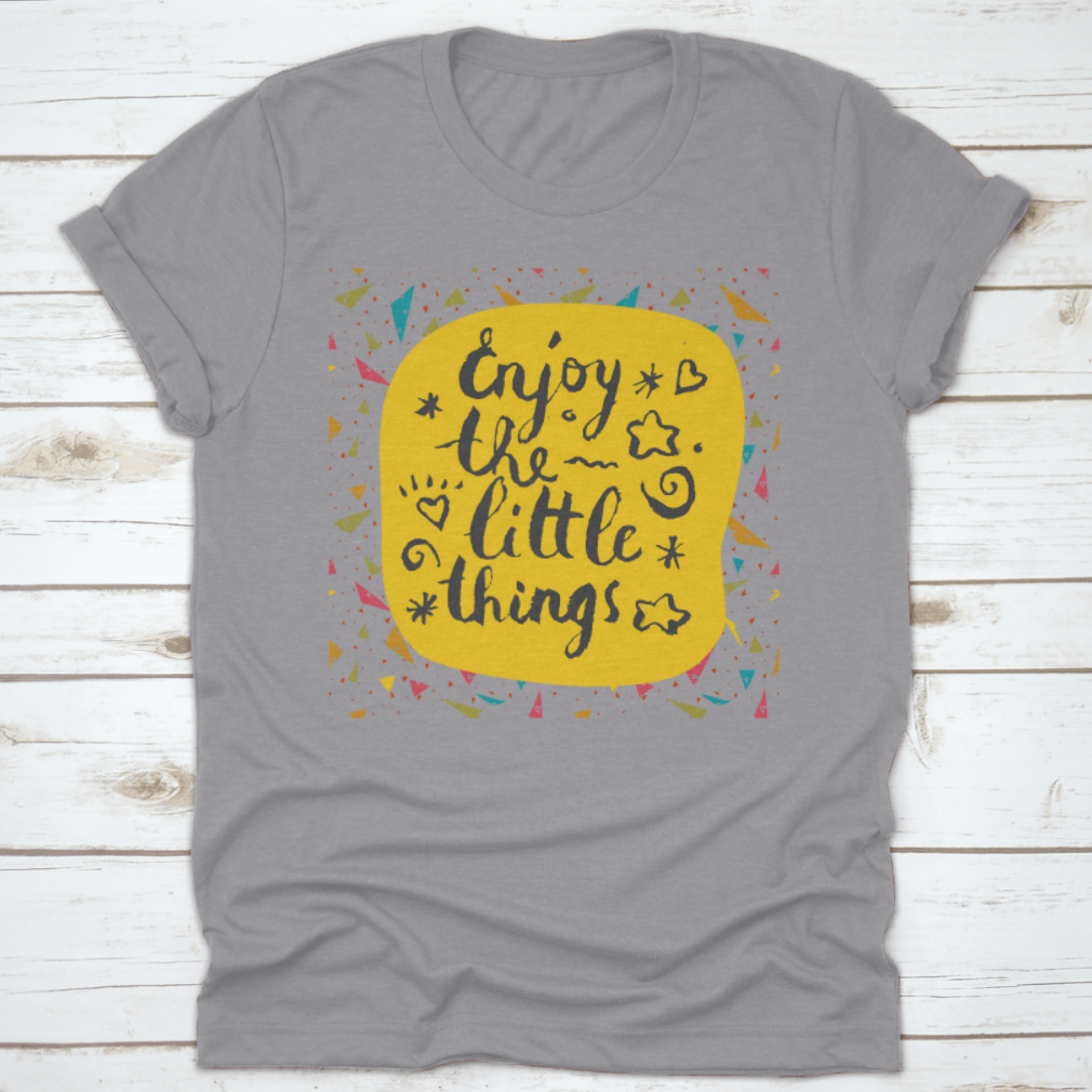 A comfortable cotton shirt featuring the motivational quote 'Enjoy The Little Things' in elegant calligraphy, perfect for casual wear.
