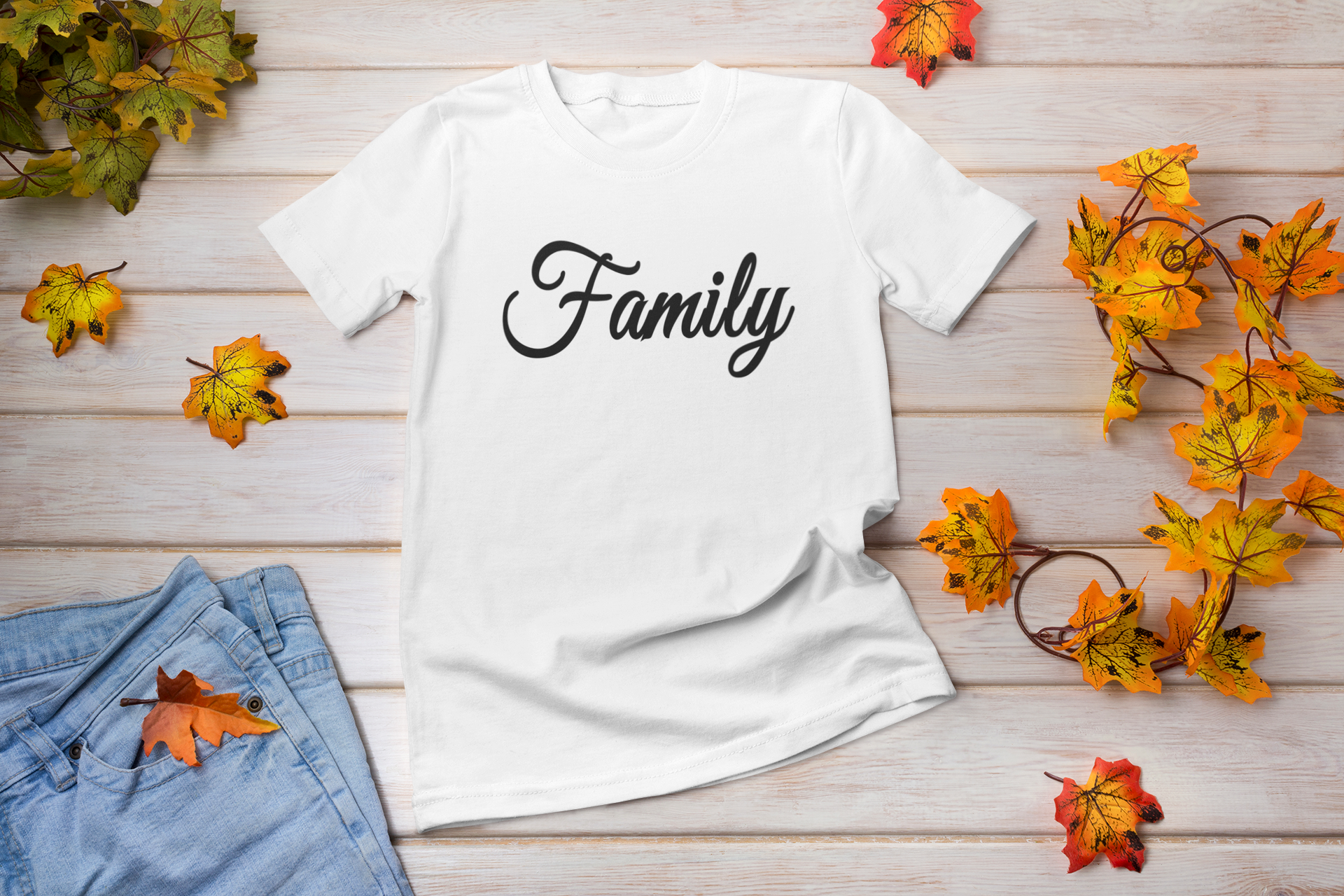 A unisex Family Lettering T-shirt displayed on a mannequin, featuring a comfortable retail fit and soft fabric.