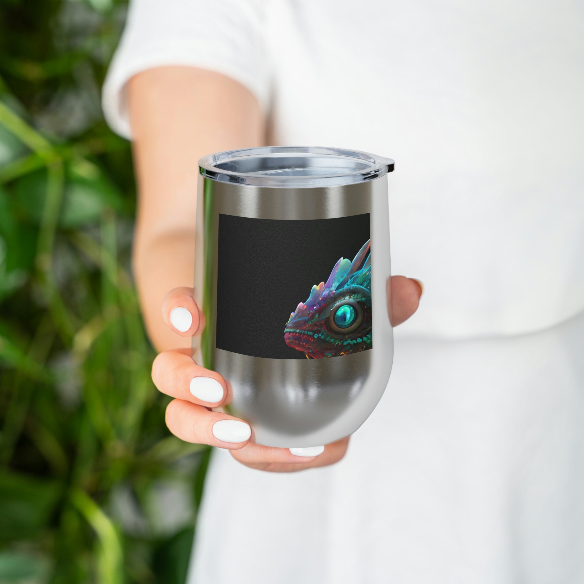 Feathered Dragon Wine Tumbler with a unique design, featuring a clear plastic lid and double-wall insulation for hot and cold beverages.