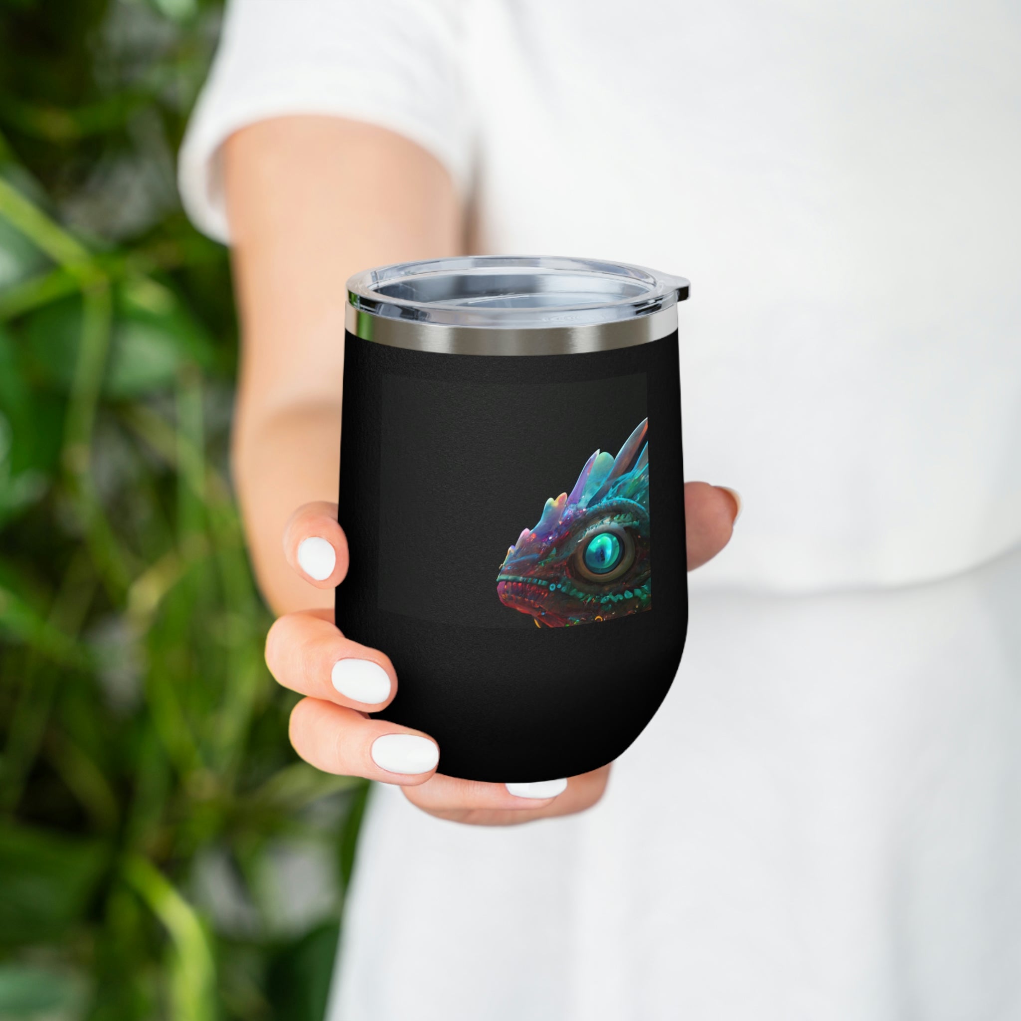 Feathered Dragon Wine Tumbler with a unique design, featuring a clear plastic lid and double-wall insulation for hot and cold beverages.