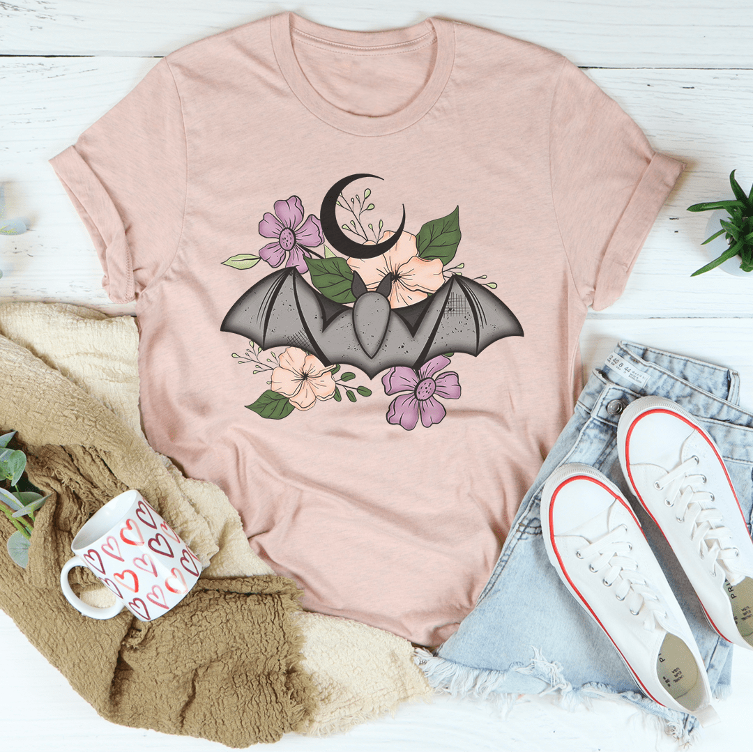 A stylish Floral Bat Tee featuring a vibrant bat design with floral elements, made from 100% soft cotton.