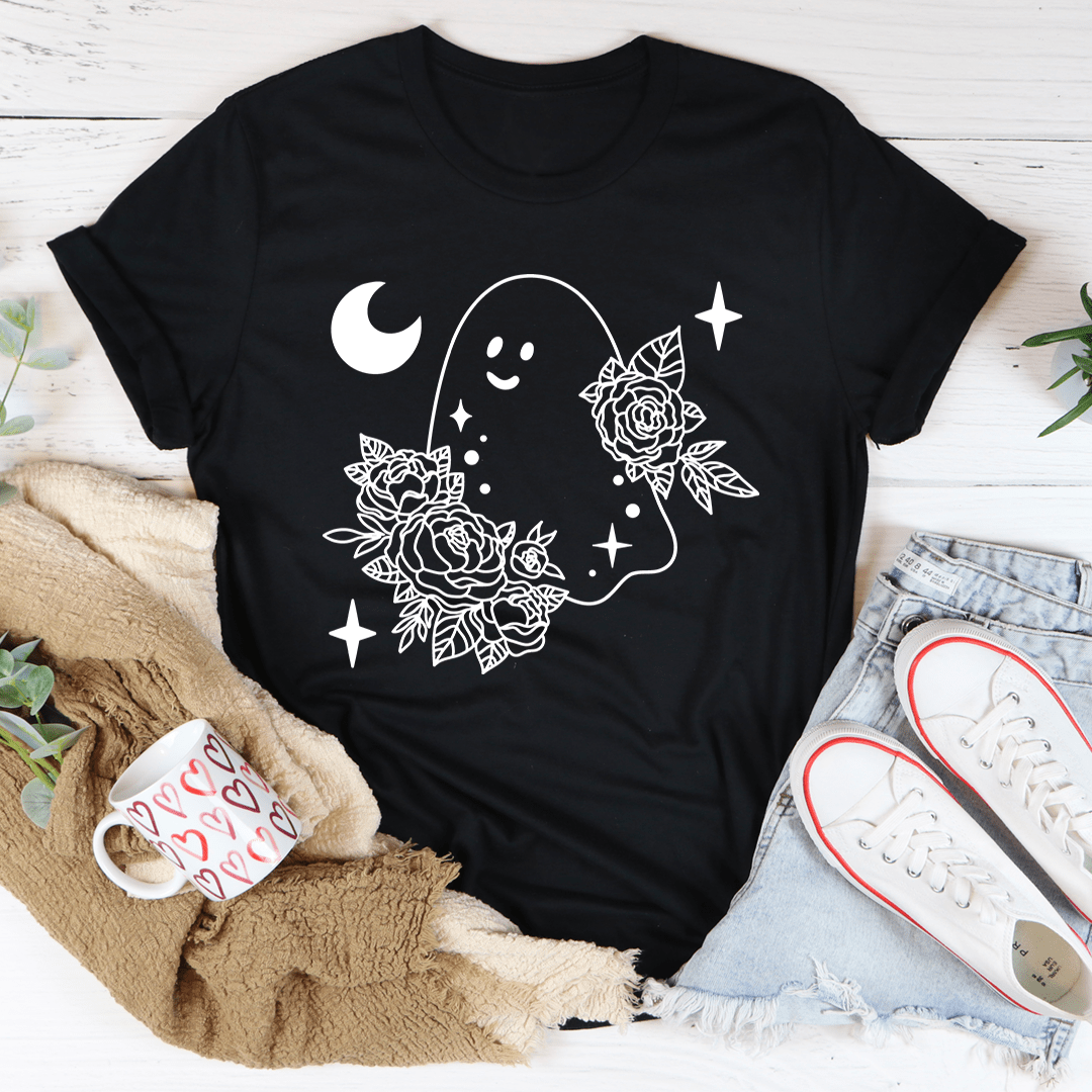 A stylish Floral Ghost Tee featuring a playful ghost design surrounded by vibrant flowers, perfect for Halloween celebrations.