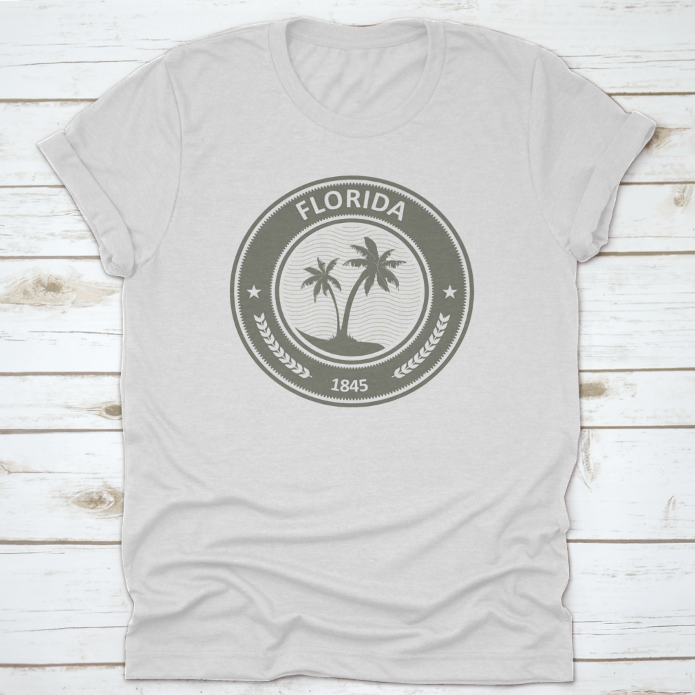 Florida Stamp T-Shirt featuring a vibrant state label with palm trees, made from 100% cotton for comfort.