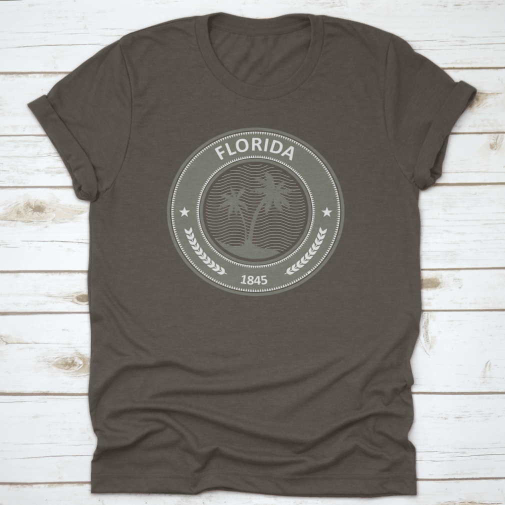 Florida Stamp T-Shirt featuring a vibrant state label with palm trees, made from 100% cotton for comfort.
