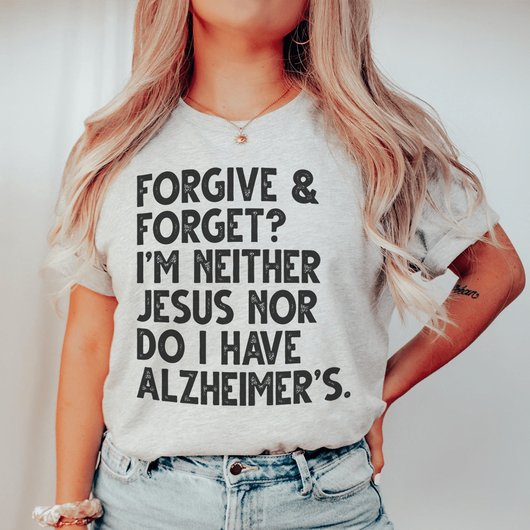 A soft and durable Forgive & Forget T-Shirt displayed on a mannequin, showcasing its comfortable fit and stylish design.