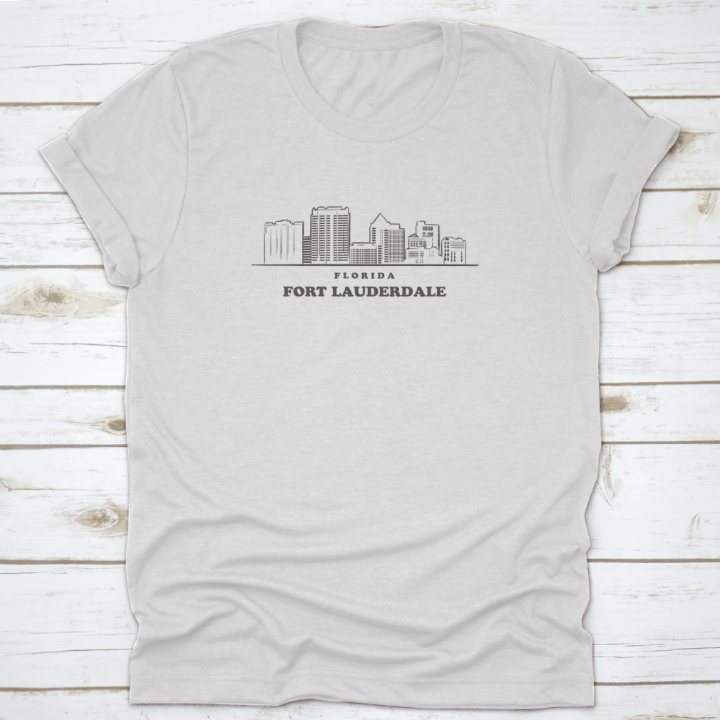 A stylish T-shirt featuring a drawn sketch vector design of the Fort Lauderdale skyline, showcasing iconic buildings and palm trees.