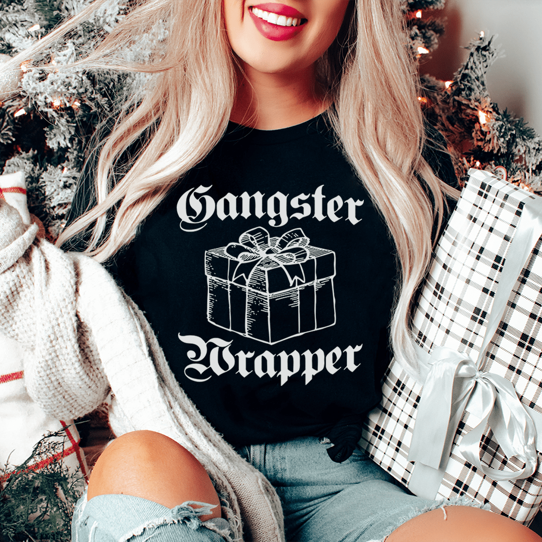 Gangster Wrapper Tee featuring a festive design, made from 100% soft cotton, perfect for holiday celebrations.