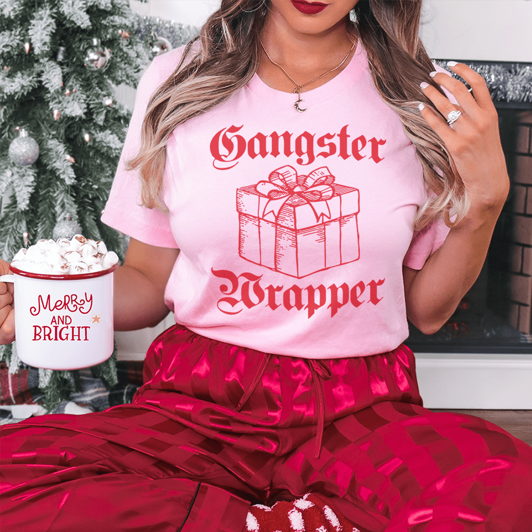 Gangster Wrapper Tee featuring a festive design, made from 100% soft cotton, perfect for holiday celebrations.