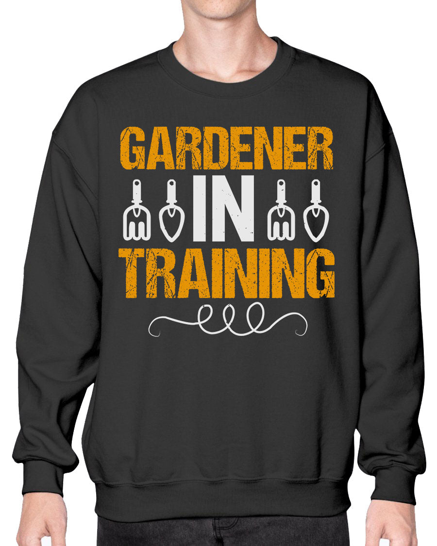 Garderner in Training sweatshirt featuring a cozy crew neck design, perfect for gardening enthusiasts.