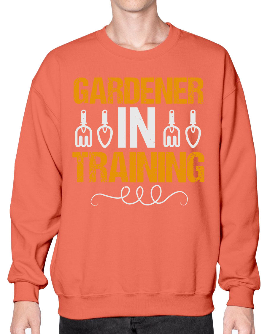 Garderner in Training sweatshirt featuring a cozy crew neck design, perfect for gardening enthusiasts.