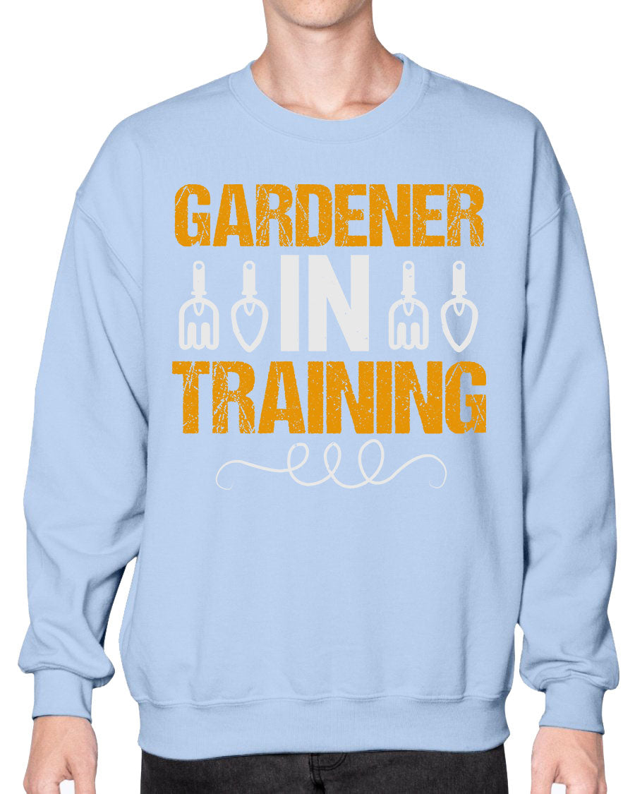 Garderner in Training sweatshirt featuring a cozy crew neck design, perfect for gardening enthusiasts.