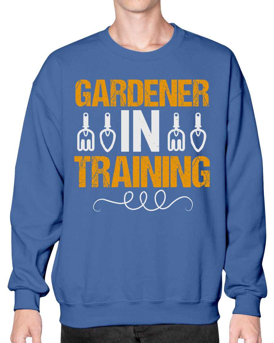 Garderner in Training sweatshirt featuring a cozy crew neck design, perfect for gardening enthusiasts.