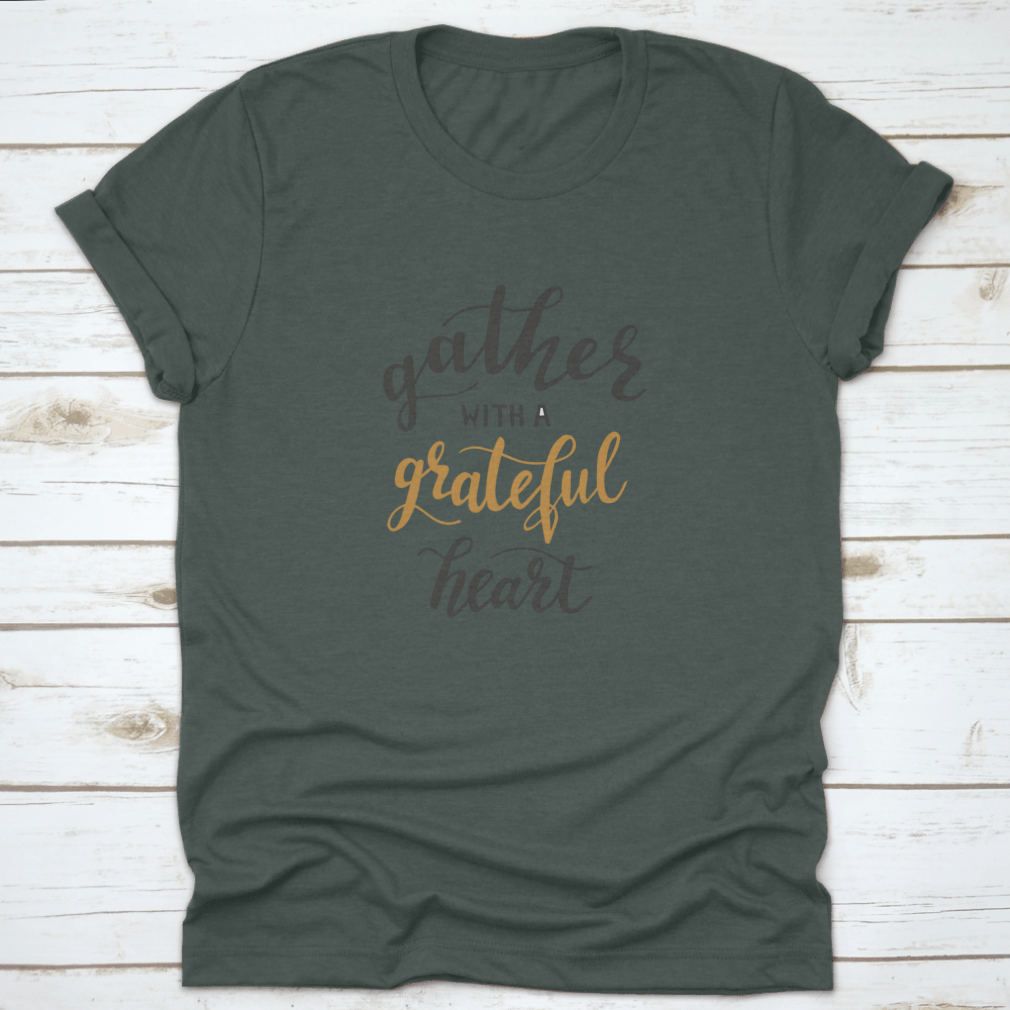 A comfortable t-shirt featuring the motivational quote 'Gather With A Grateful Heart' in an inspiring design, perfect for casual wear.