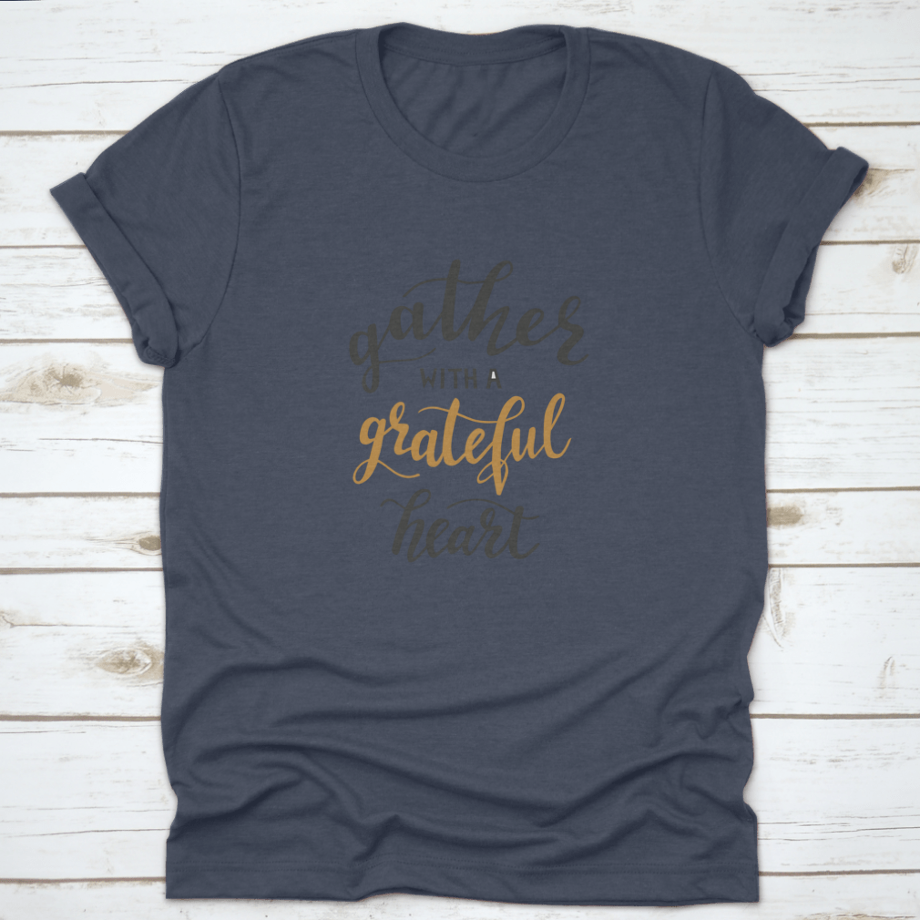 A comfortable t-shirt featuring the motivational quote 'Gather With A Grateful Heart' in an inspiring design, perfect for casual wear.